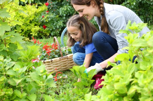 Experienced gardeners in Parsons Green shaping seasonal garden structure